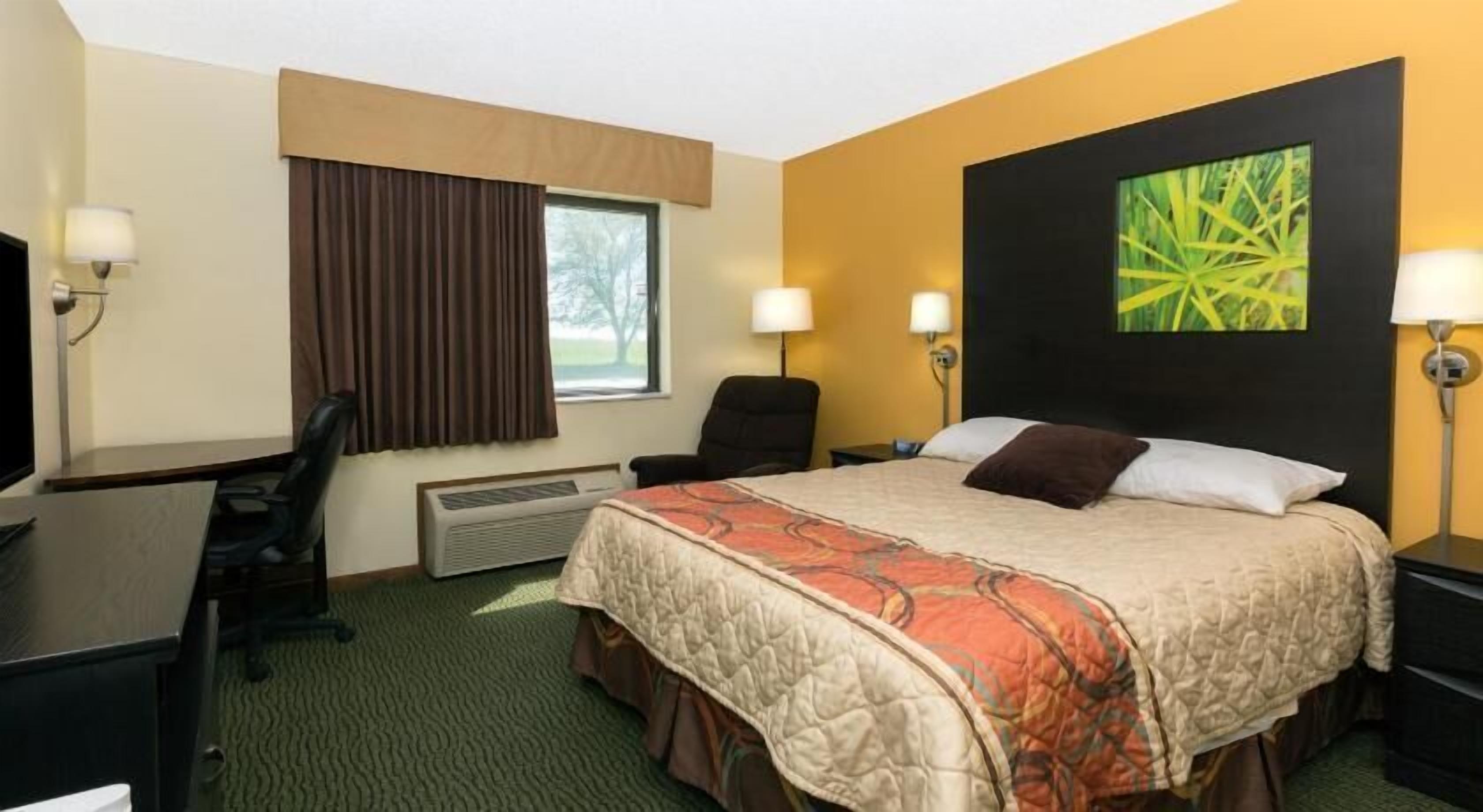 Desk, blackout drapes, iron/ironing board, free cribs/infant beds