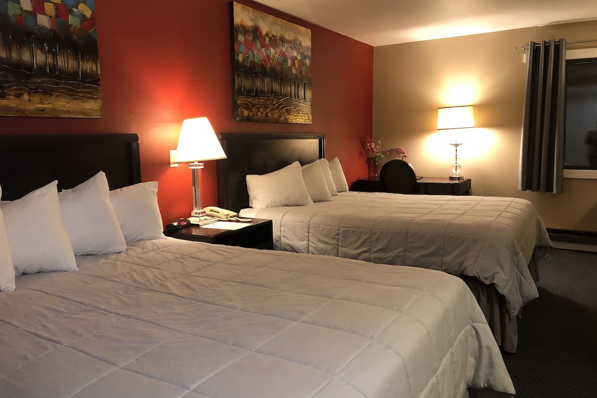 standard room, 2 queen beds | 1 bedroom, individually furnished, desk, laptop workspace