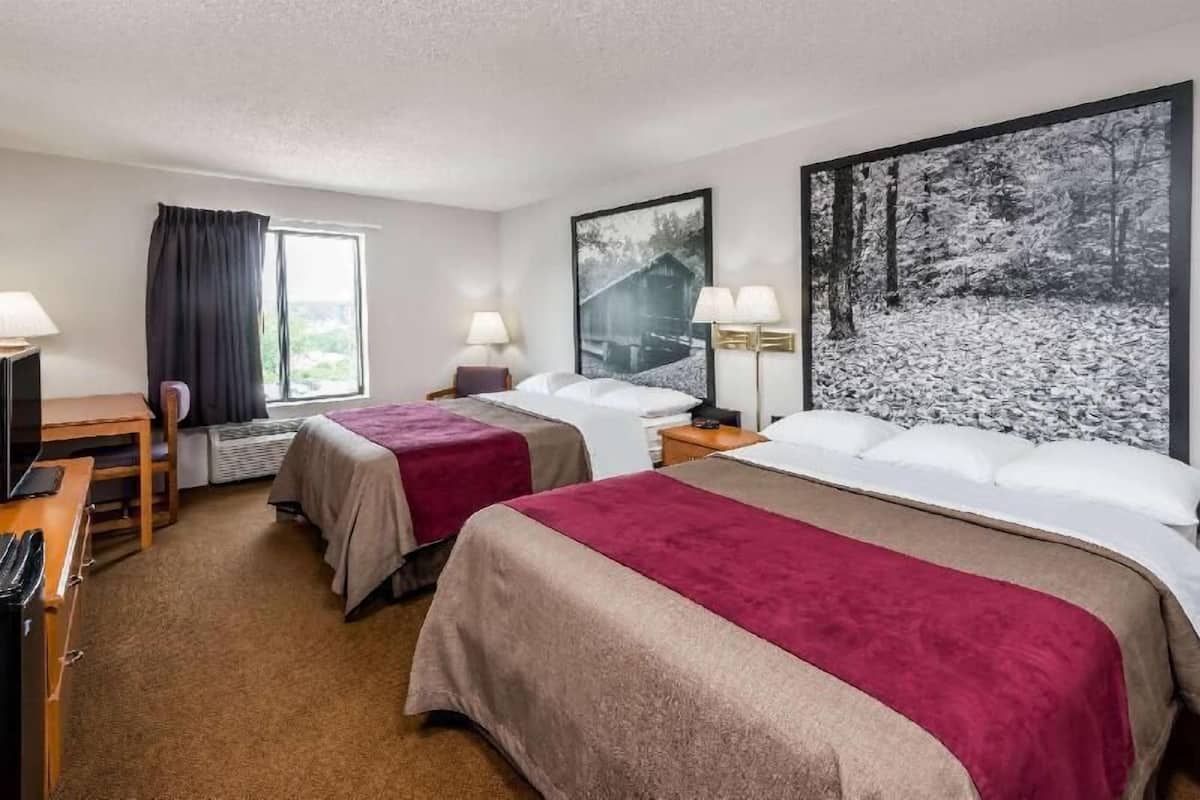 Desk, blackout drapes, free cribs/infant beds, free WiFi