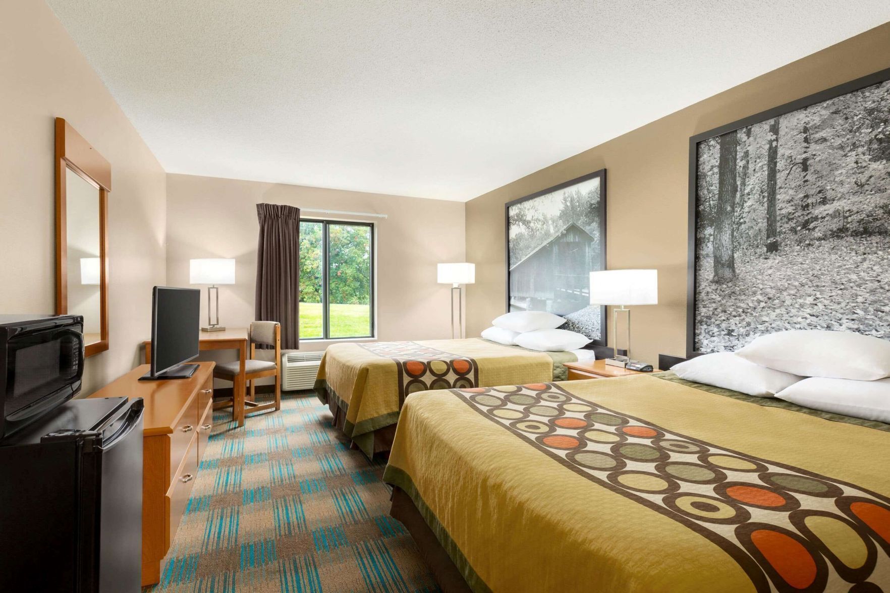 Desk, blackout curtains, free cots/infant beds, free WiFi