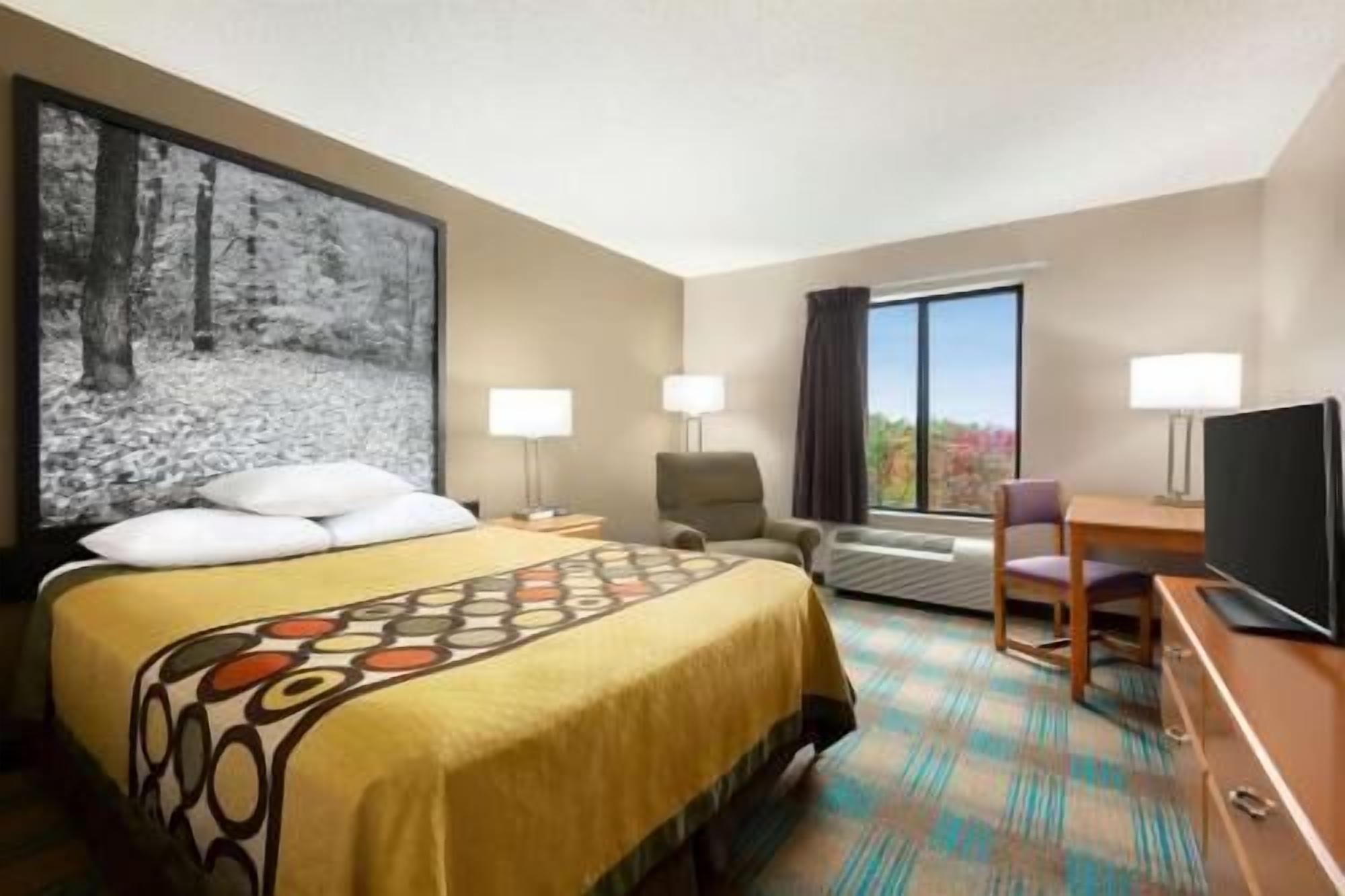 Desk, blackout curtains, free cots/infant beds, free WiFi