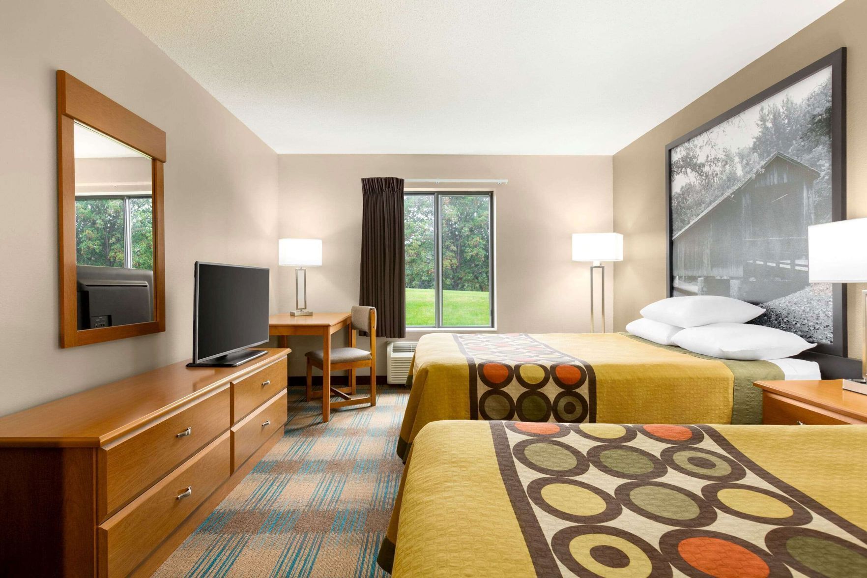 Desk, blackout curtains, free cots/infant beds, free WiFi