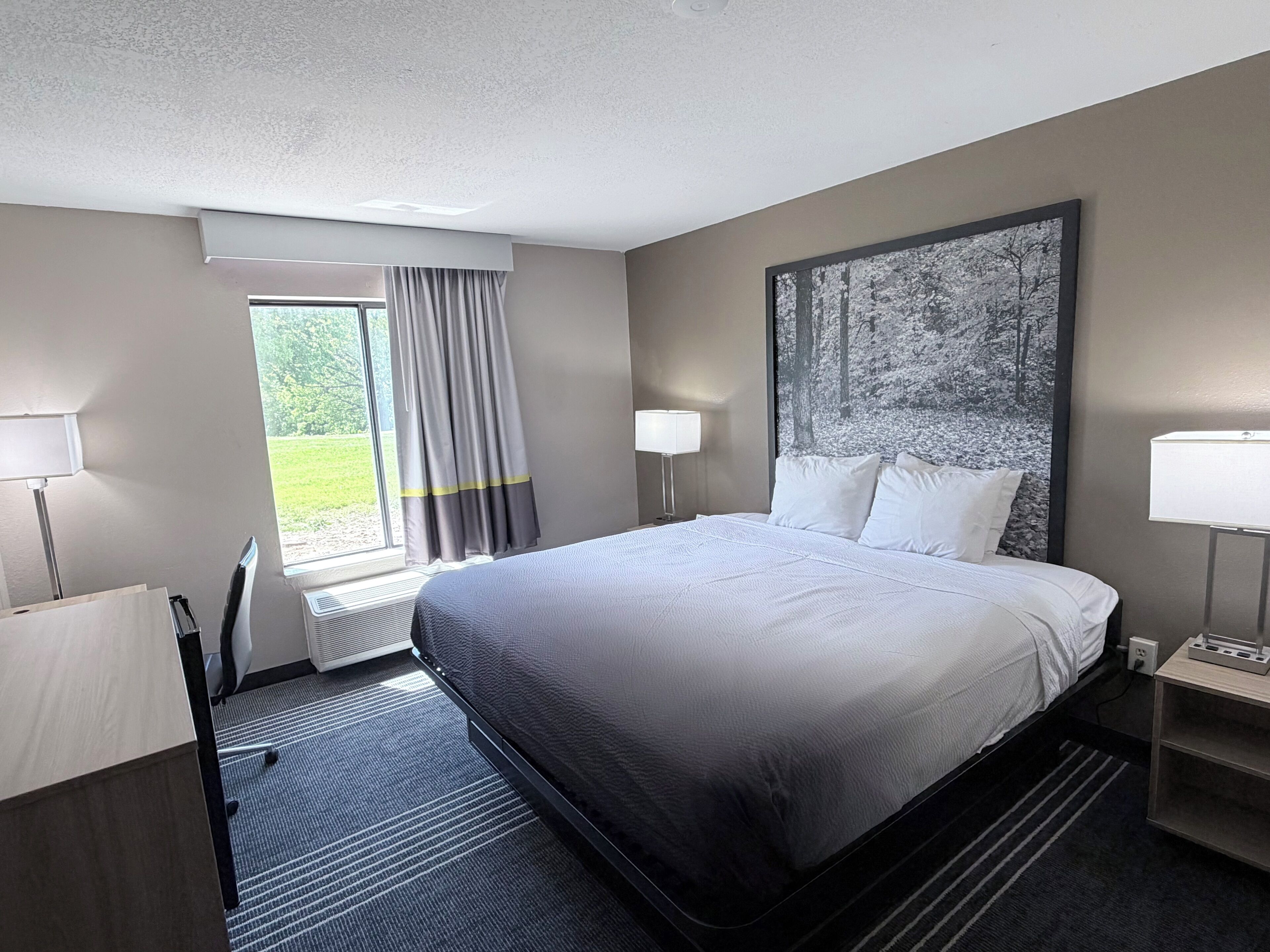 Desk, blackout curtains, free cots/infant beds, free WiFi