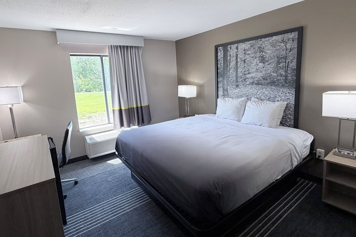 Desk, blackout curtains, free cots/infant beds, free WiFi