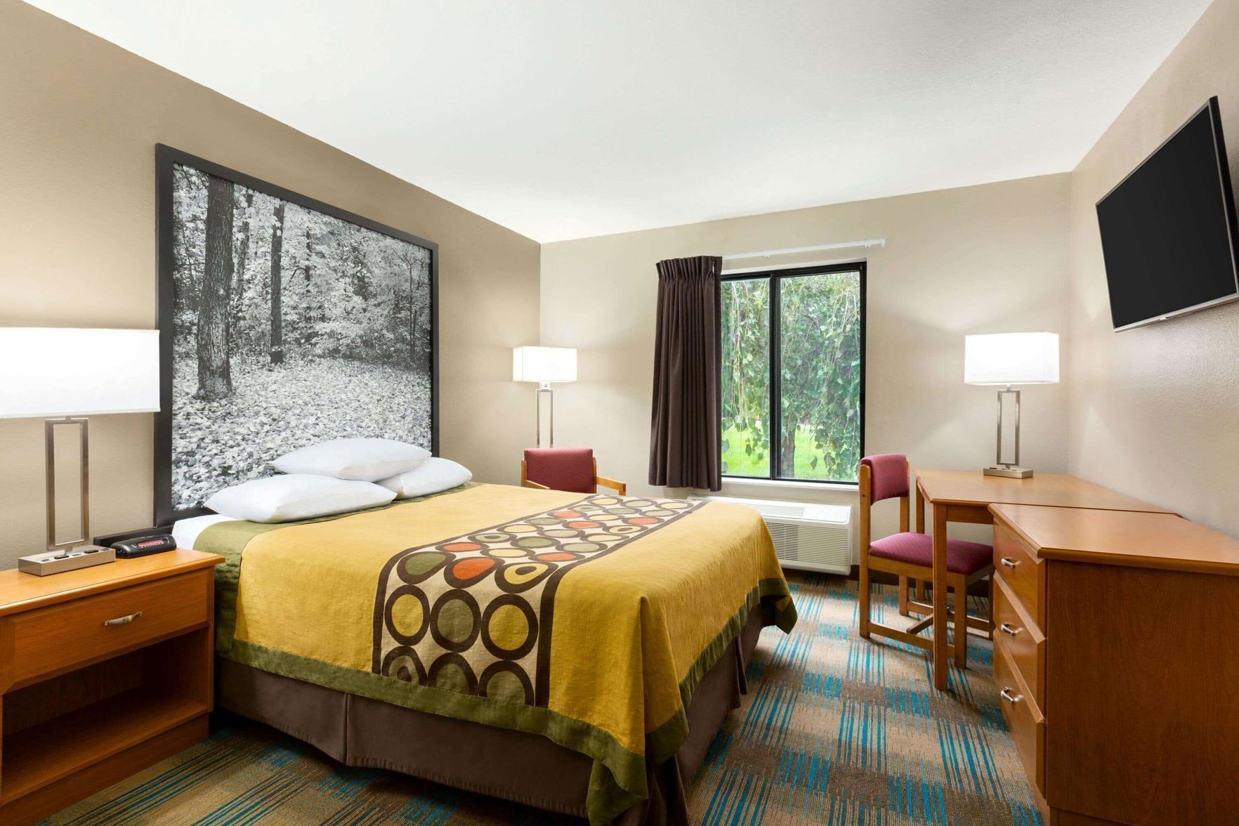 Desk, blackout curtains, free cots/infant beds, free WiFi