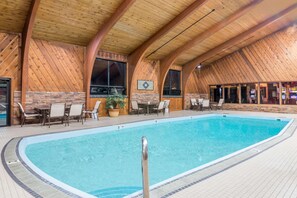 Indoor pool, open 7 AM to 10:30 PM, pool loungers