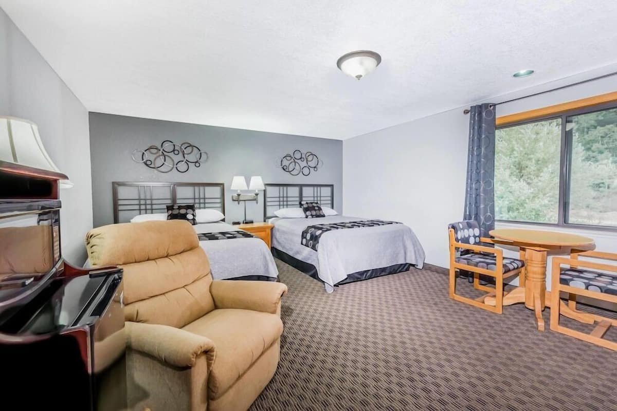 Pillowtop beds, blackout drapes, iron/ironing board, free WiFi