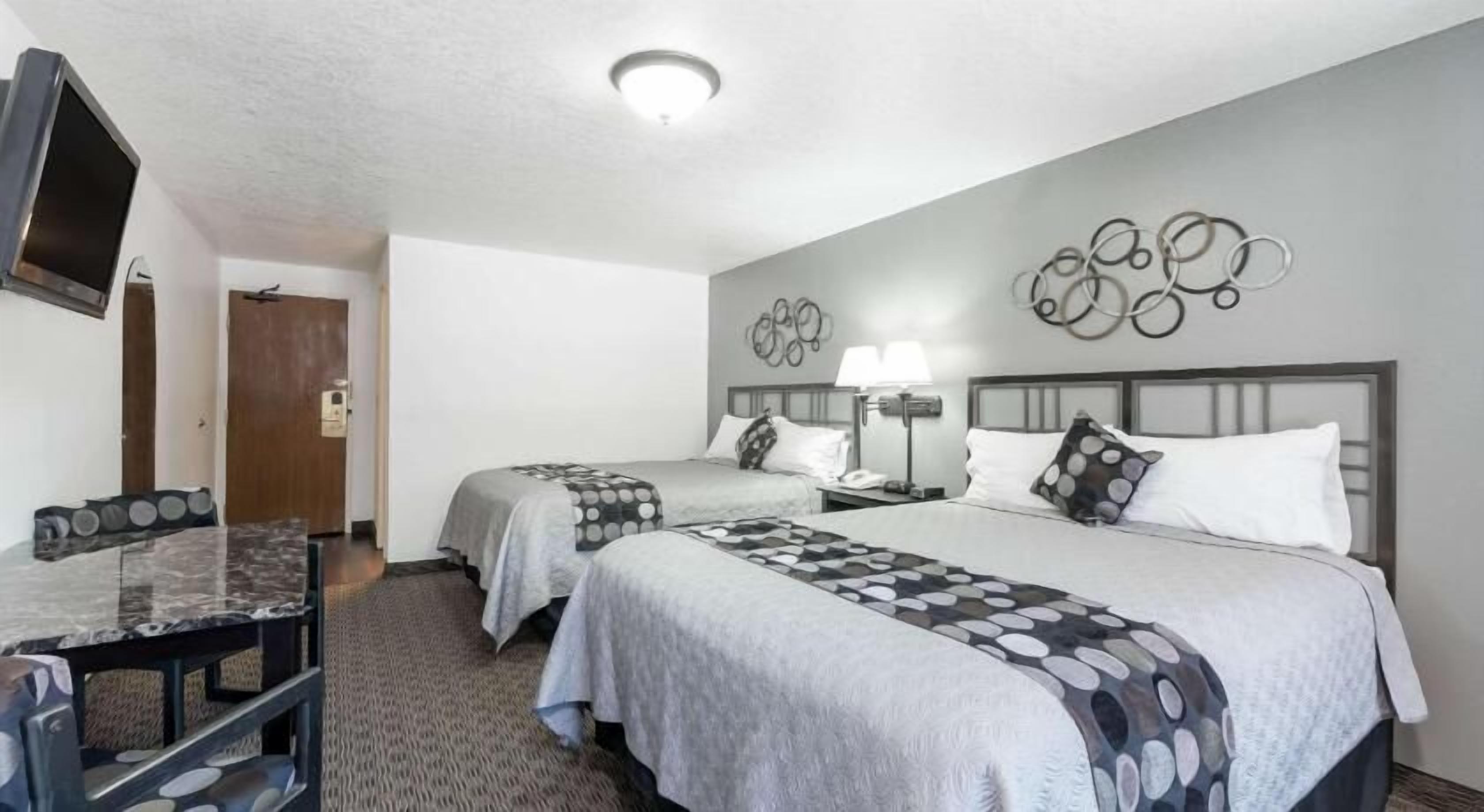 Pillow-top beds, blackout curtains, iron/ironing board, free WiFi