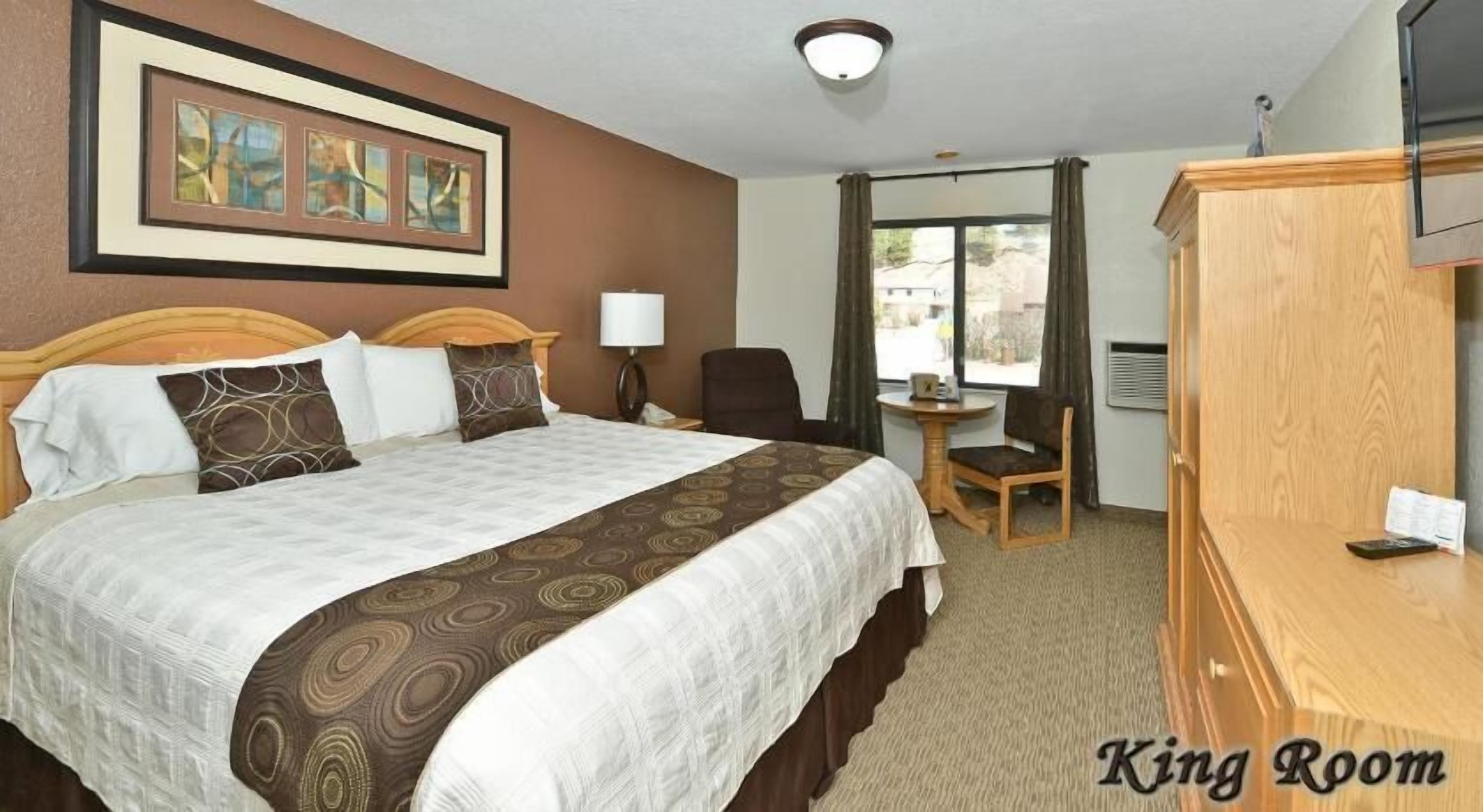 Pillow-top beds, blackout curtains, iron/ironing board, free WiFi