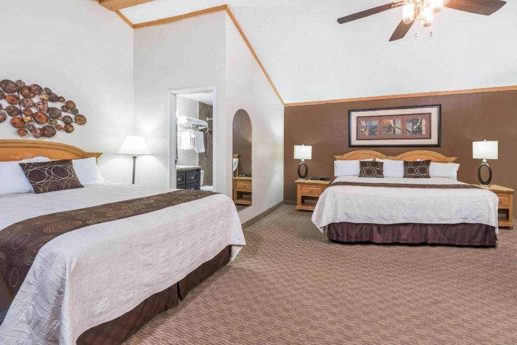 Pillow-top beds, blackout curtains, iron/ironing board, free WiFi