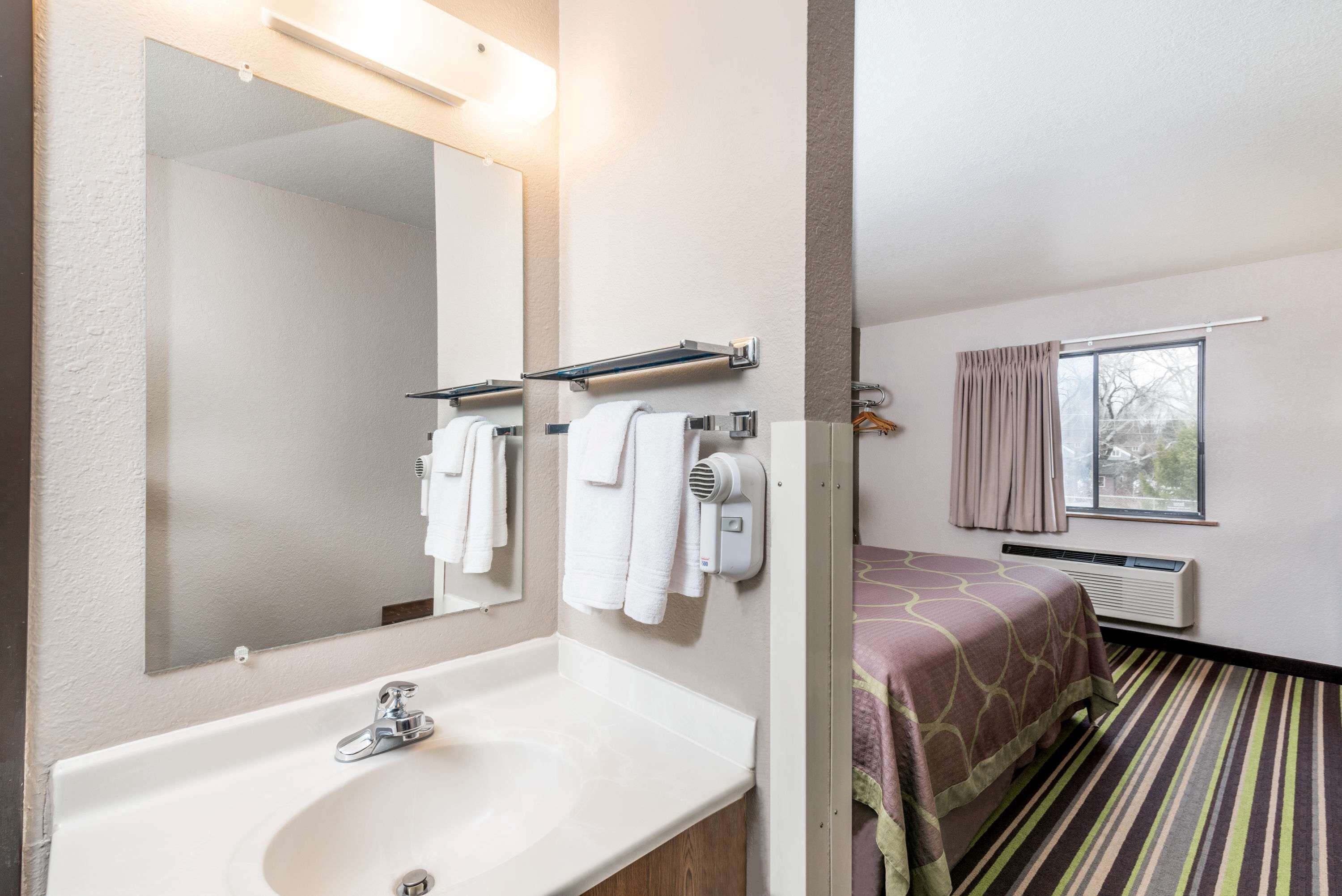 combined shower/bathtub, free toiletries, hair dryer, towels