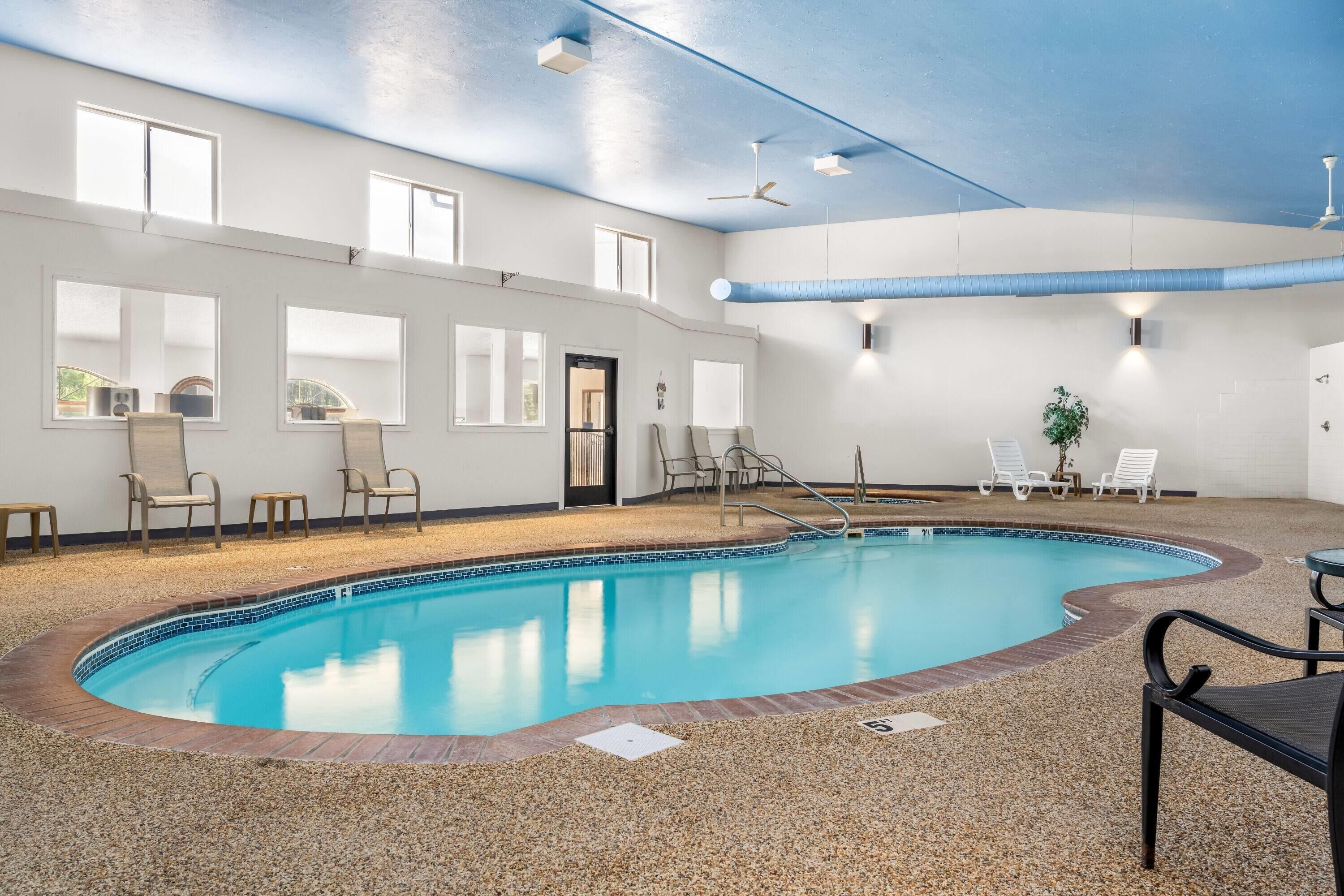 indoor pool, open 8:00 am to 10 pm, pool loungers