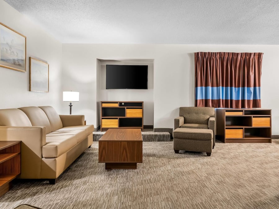 Desk, laptop workspace, blackout curtains, iron/ironing board