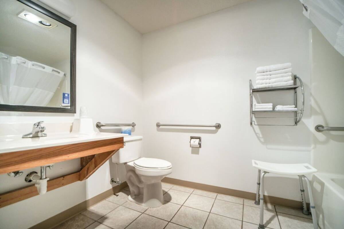 suite, multiple beds, non smoking (efficiency) | bathroom | combined shower/bathtub, rainfall showerhead, free toiletries