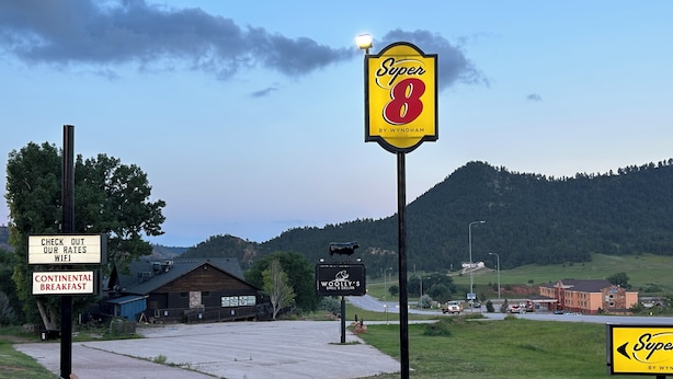 A restaurant named 'Super 8' with a sign indicating 'Continental Breakfast'. - Super 8 by Wyndham Hot Springs (Hot Springs)
