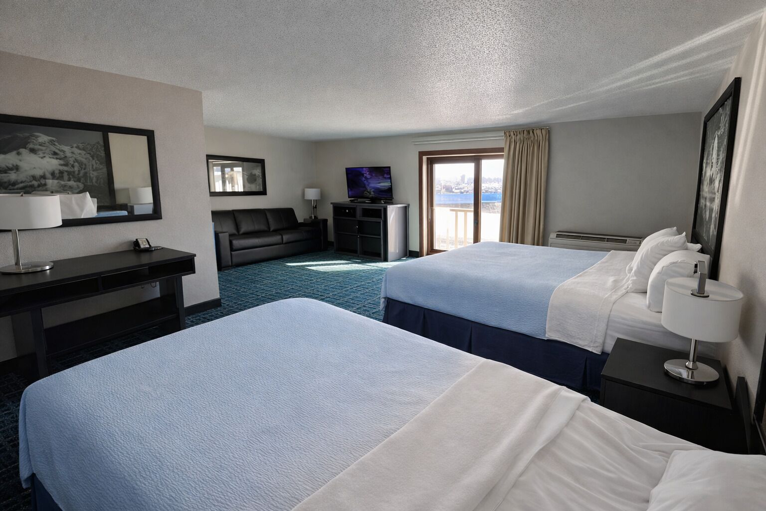 Suite | Premium bedding, desk, laptop workspace, blackout curtains