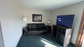 Suite | Coin séjour | Télévision de 32 pouces avec chaßnes par cùble