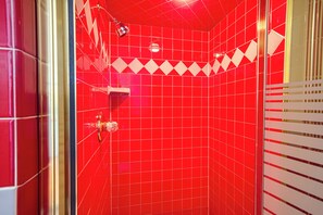 Suite, 1 King Bed, Hot Tub | Bathroom | Free toiletries, hair dryer, towels, soap