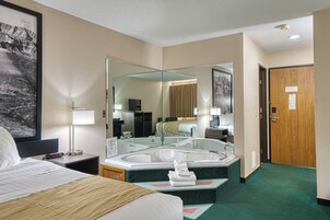 Suite, 1 Queen Bed, Jetted Tub | Premium bedding, desk, laptop workspace, blackout drapes