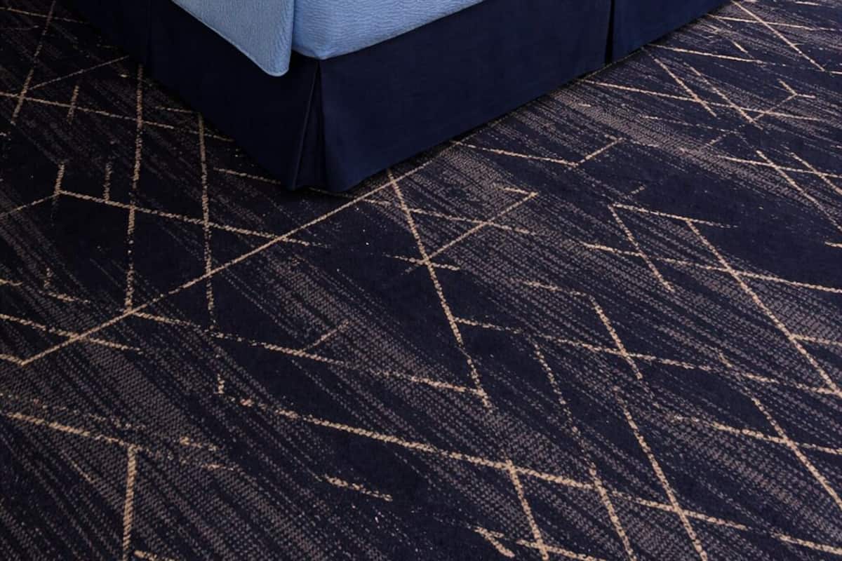 Premium bedding, desk, laptop workspace, blackout curtains