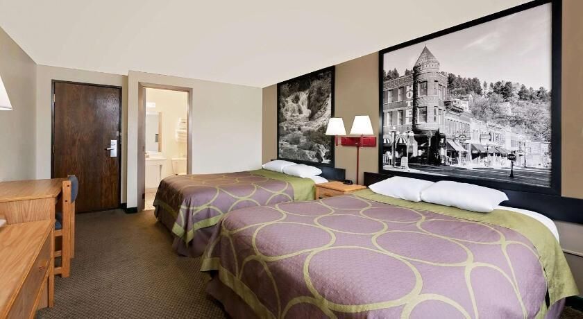 Desk, blackout curtains, free WiFi, bed sheets
