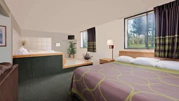 Habitación superior, 1 cama de matrimonio grande, no fumadores, bañera de hidromasaje | Escritorio, cortinas opacas, wifi gratis y ropa de cama