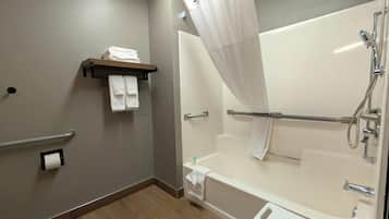 Room, 1 King Bed, Non Smoking (Bathtub w/ Grab Bars) | Bathroom | Combined shower/tub, hair dryer, towels