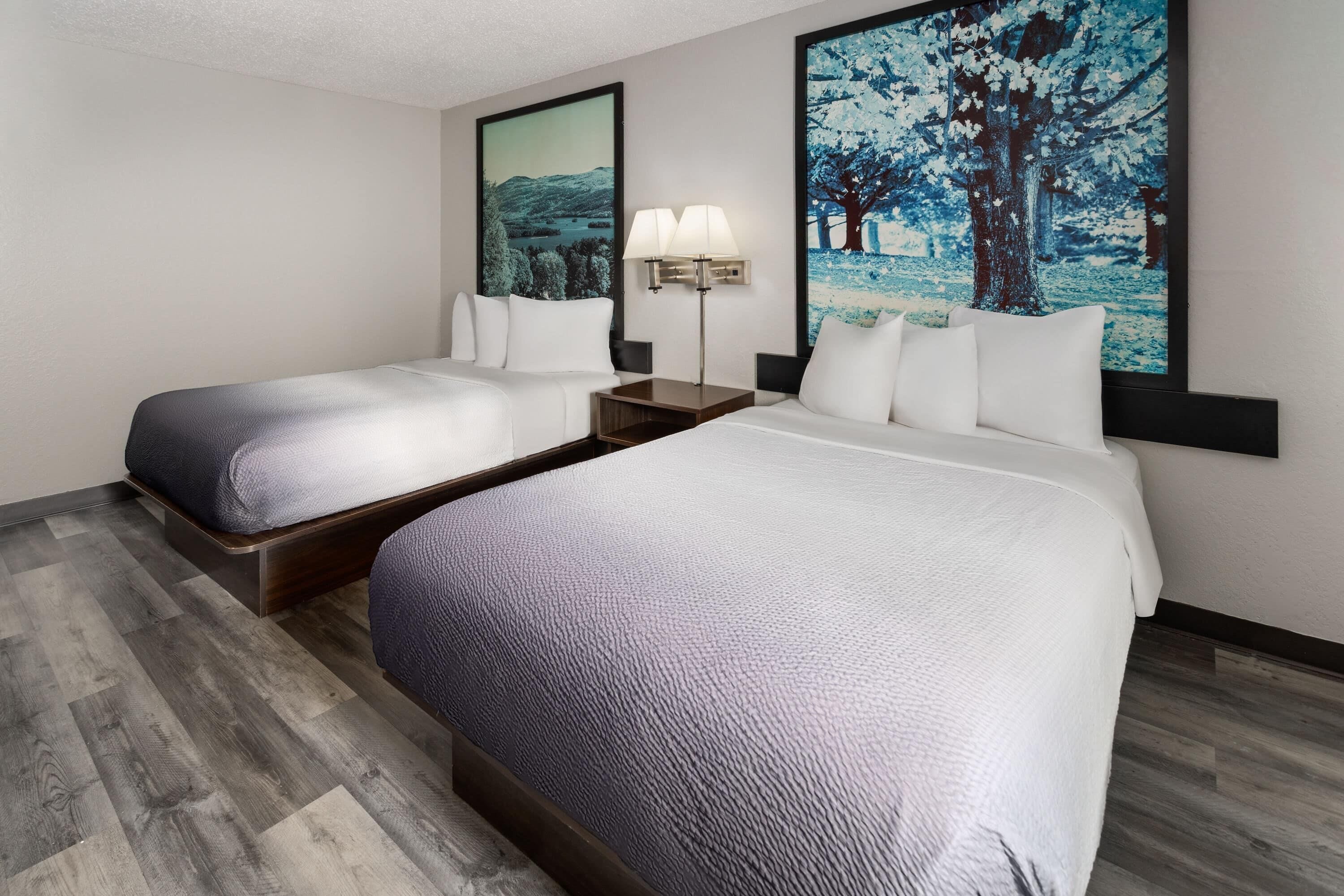 Pillow-top beds, desk, laptop workspace, blackout curtains
