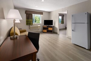 1-Bedroom Suite,1 King Bed and 1 Queen Sofa Bed, Non-Smoking | Pillowtop beds, desk, laptop workspace, blackout drapes