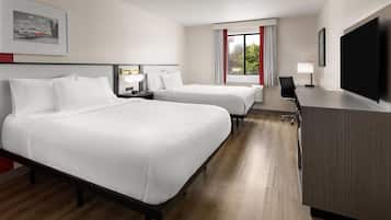 Select Comfort beds, desk, laptop workspace, iron/ironing board