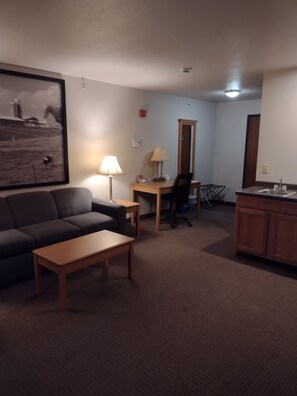 Suite, 1 Queen Bed, Refrigerator | Living area