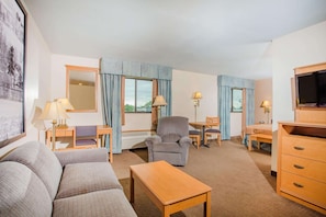 Suite, 1 King Bed, Refrigerator | In-room safe, individually decorated, individually furnished, desk