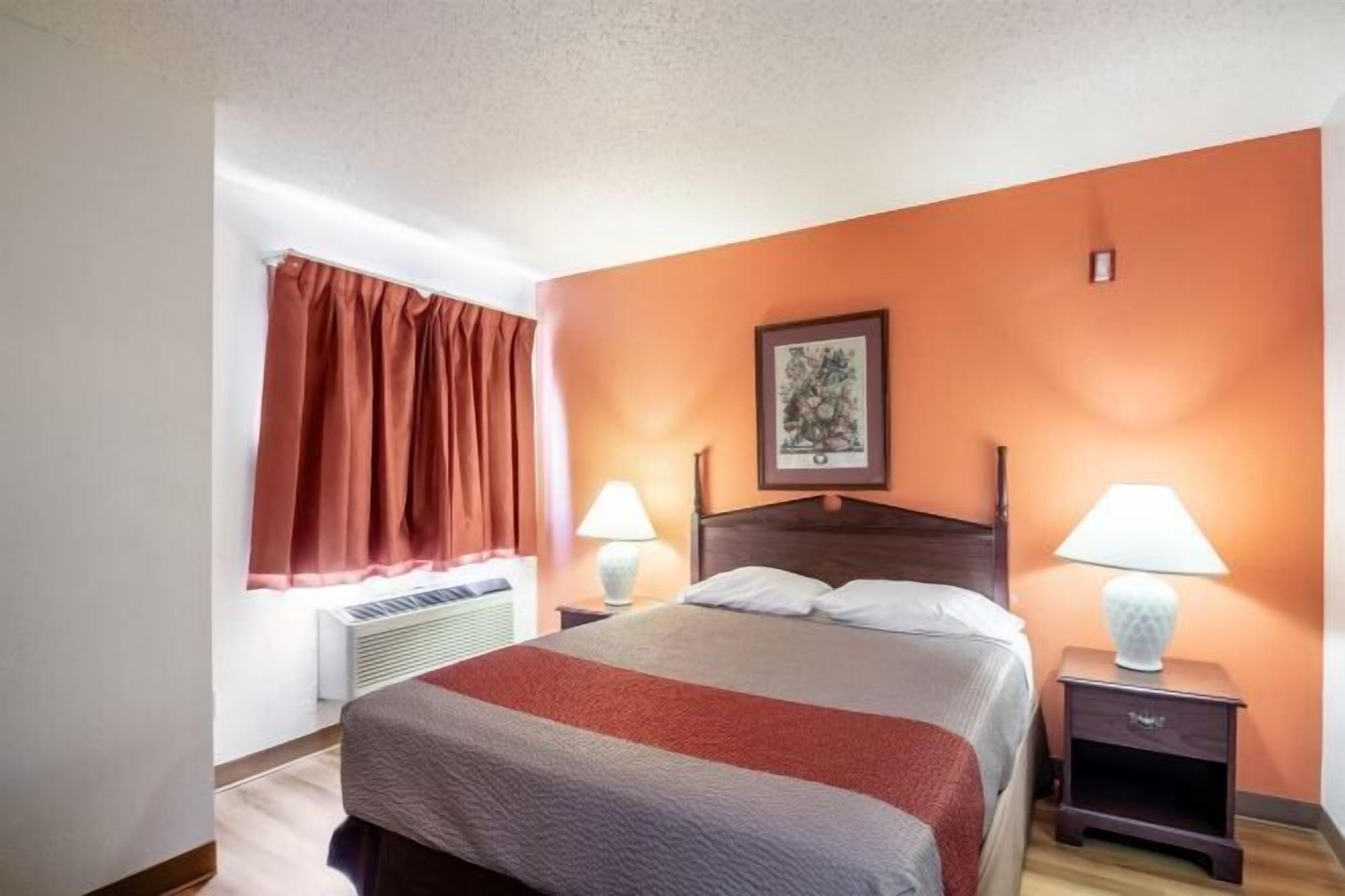 Desk, blackout curtains, free cots/infant beds, free WiFi