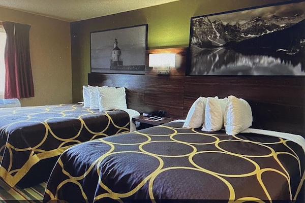 Desk, laptop workspace, blackout curtains, free cots/infant beds