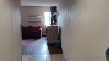 Standard Room, 1 King Bed | Living area | 32-inch flat-screen TV with cable channels, TV