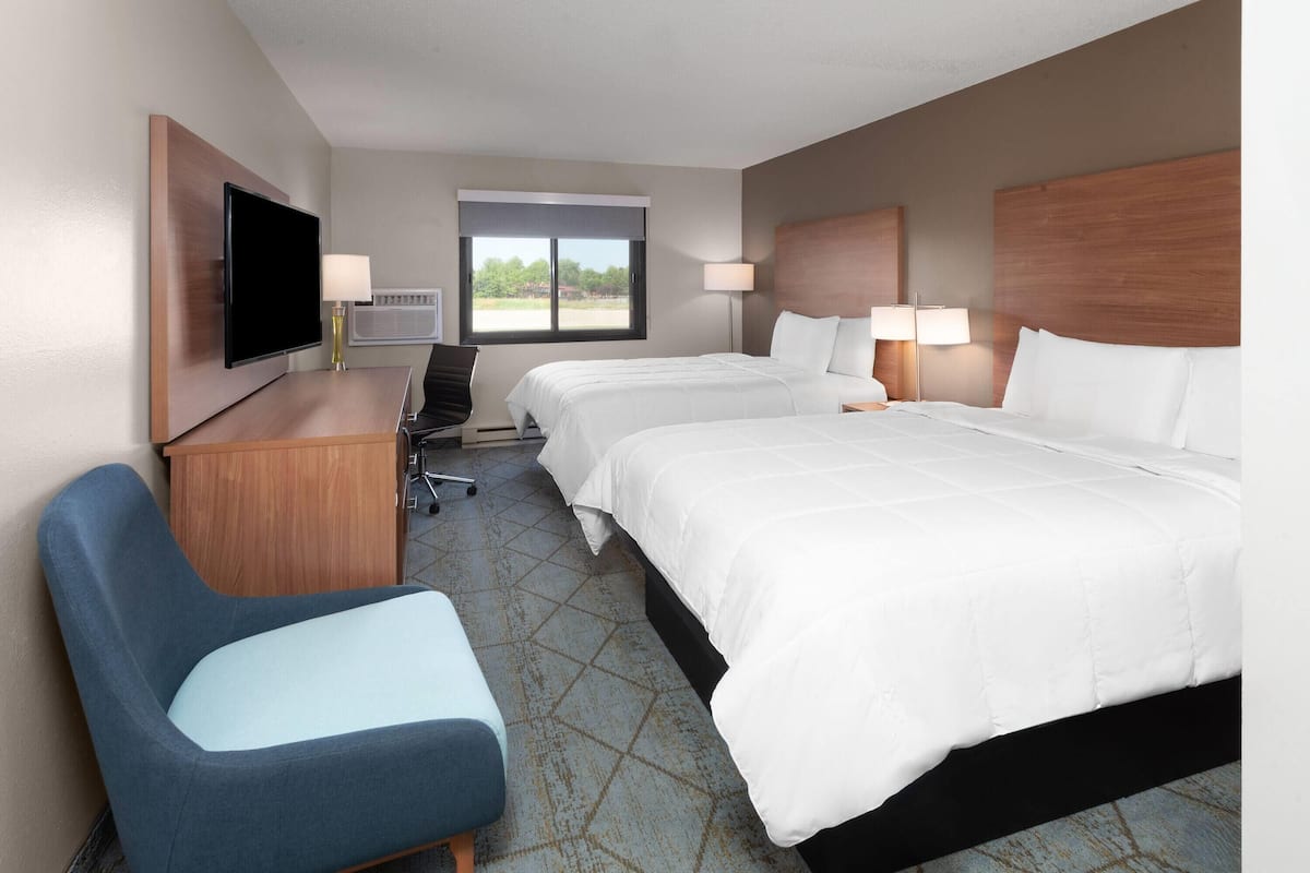 Premium bedding, desk, laptop workspace, free WiFi