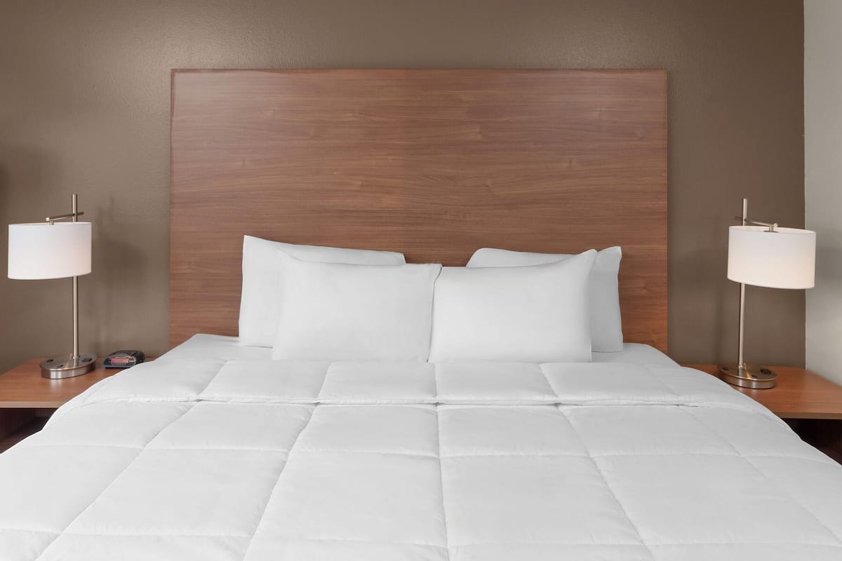 Premium bedding, desk, laptop workspace, free WiFi