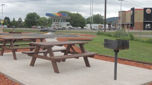 Picnic tables and a Burger King restaurant. - Super 8 by Wyndham Mifflinville Near Bloomsburg (Mifflinville)