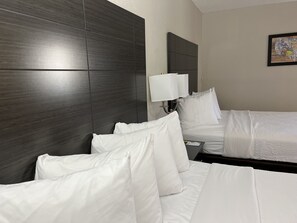 Suite, 2 Queen Beds, Non Smoking | Desk, iron/ironing board, free cribs/infant beds, rollaway beds