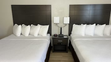 Suite, 2 Tempat Tidur Queen, Bebas Asap Rokok | Meja kerja, setrika/meja setrika, dan tempat tidur bayi gratis