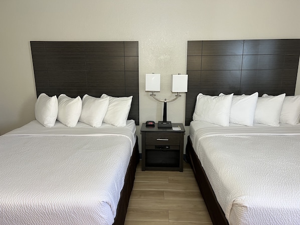 Suite, 2 Queen Beds, Non Smoking | Desk, iron/ironing board, free cots/infant beds, rollaway beds