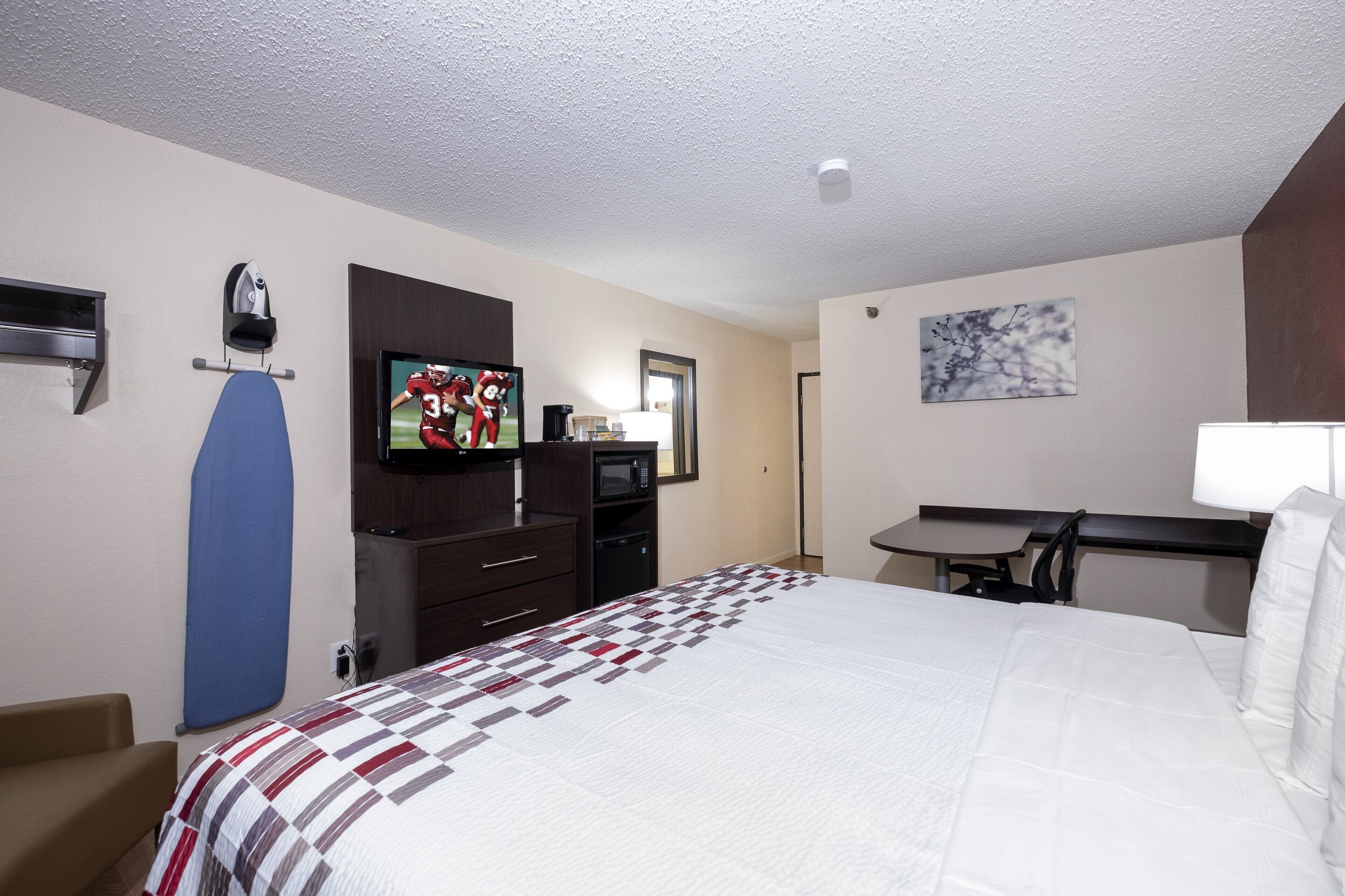 Desk, laptop workspace, blackout drapes, free cribs/infant beds