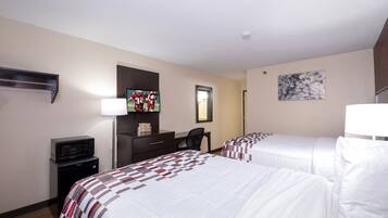 Desk, laptop workspace, blackout curtains, free cots/infant beds