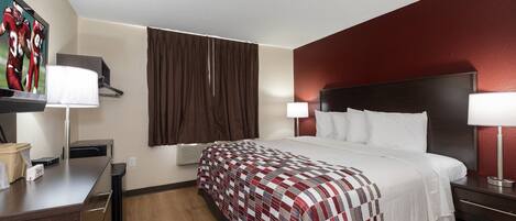 Desk, laptop workspace, blackout drapes, free cribs/infant beds