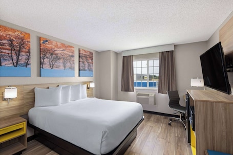 Room, 1 Queen Bed, Non Smoking (Mini Room, Second Floor, No Elevator) | Premium bedding, pillowtop beds, blackout drapes, iron/ironing board