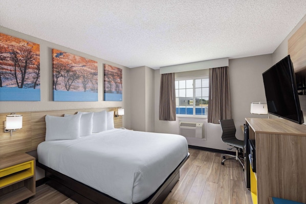 Room, 1 Queen Bed, Non Smoking (Mini Room, Second Floor, No Elevator) | Premium bedding, pillow-top beds, blackout curtains, iron/ironing board