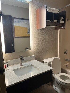 Combined shower/tub, deep soaking tub, free toiletries, hair dryer