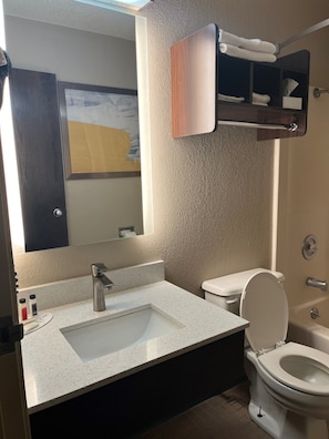 Combined shower/tub, deep soaking tub, free toiletries, hair dryer