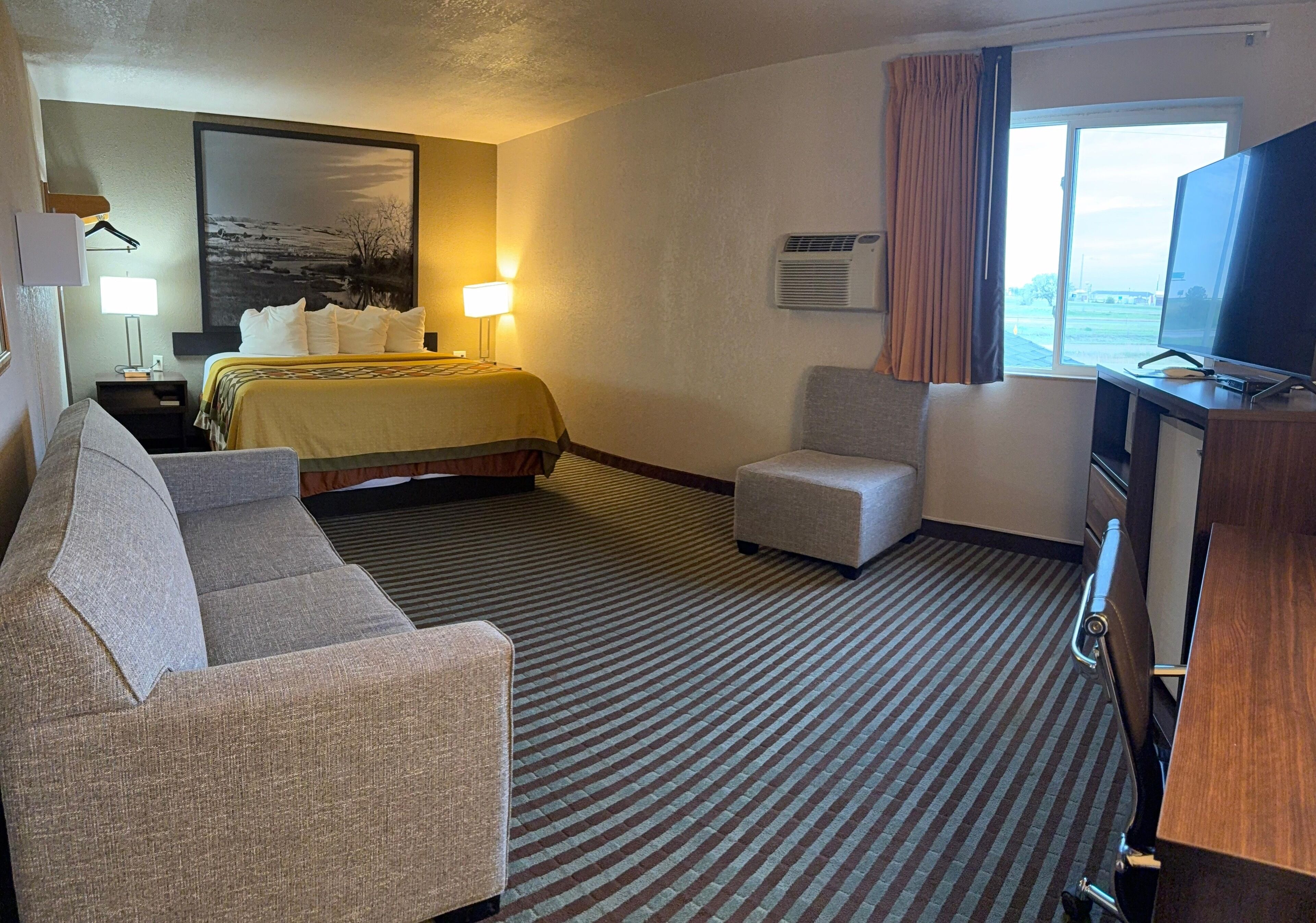 Suite, 1 King Bed, Non Smoking | Iron/ironing board, free WiFi, bed sheets