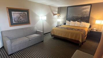 Studio Suite, 1 King Bed, Non Smoking | Desk, blackout drapes, iron/ironing board, free WiFi